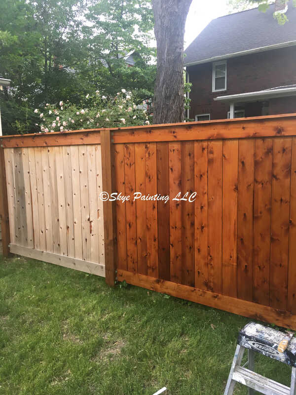 stained cedar wood fence. Skye Painting